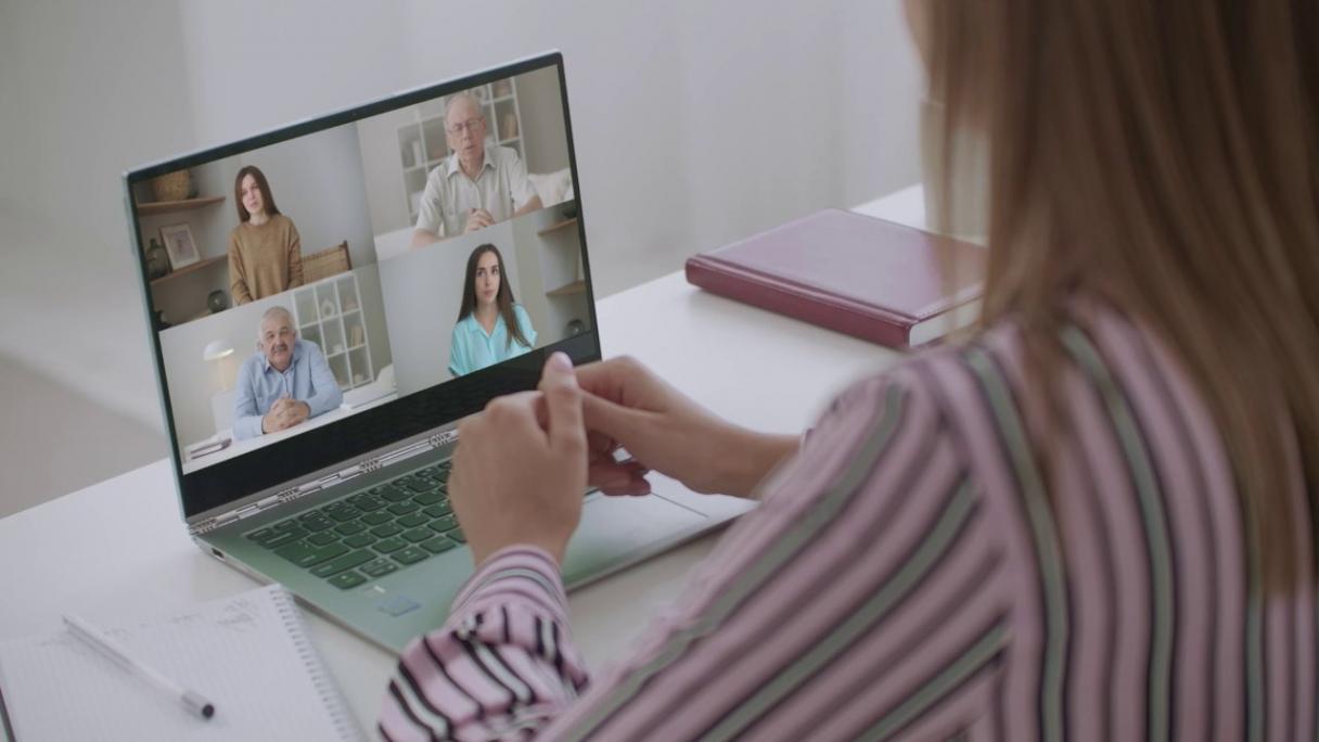 Professional reviewing detailed analytics reports with financial charts